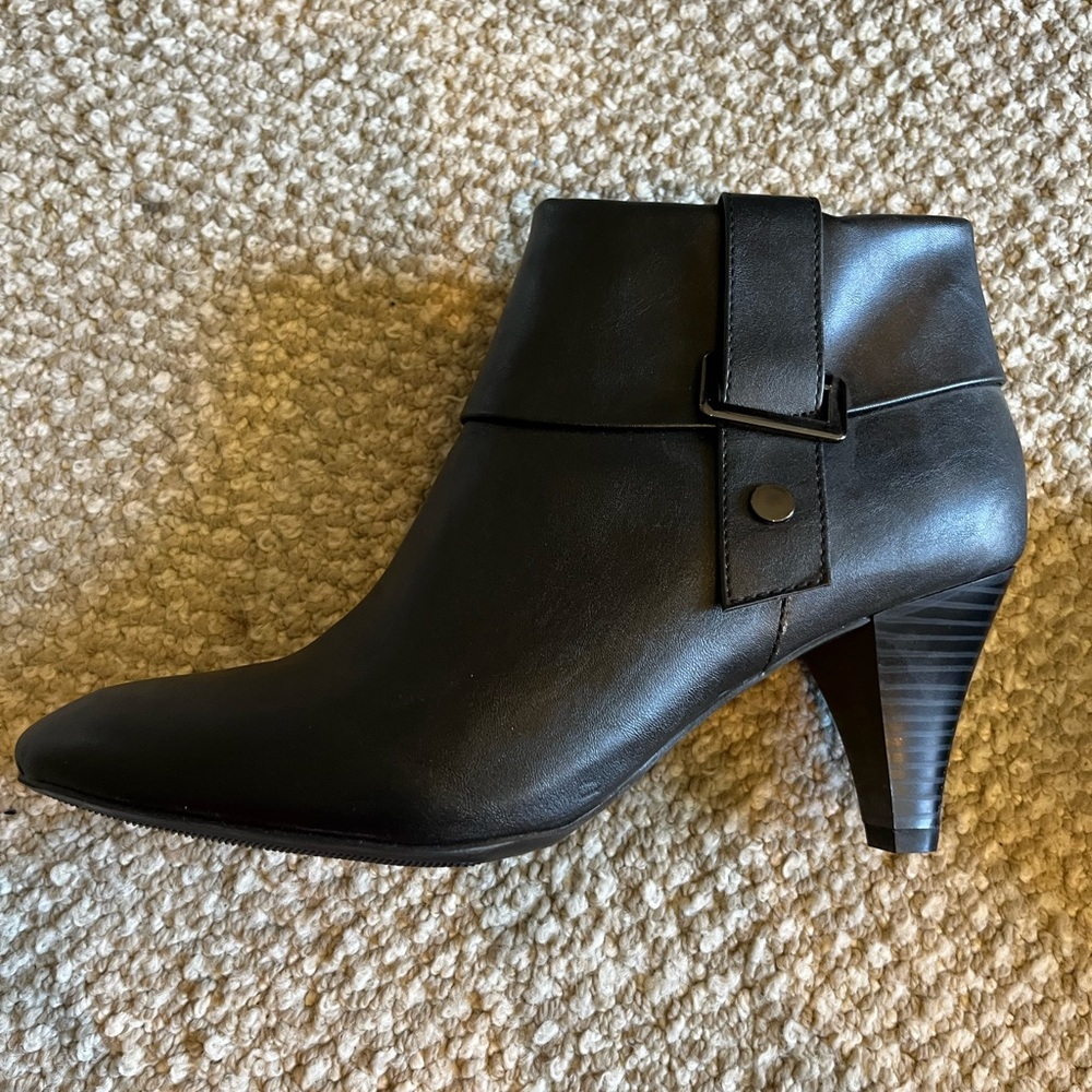 Black heeled booties! Can be dressed up or down! Brand new, never worn!